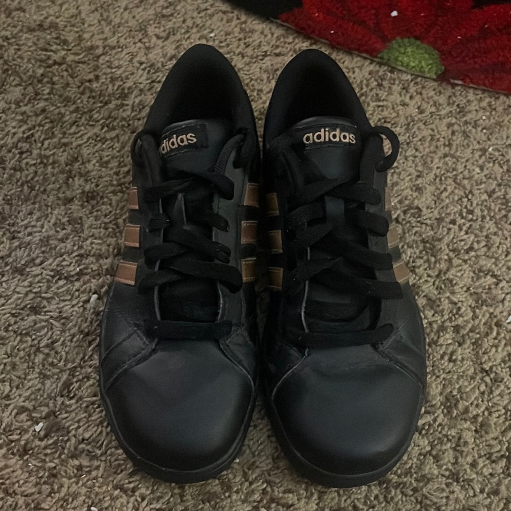 Girls Lightly worn size 4 adidas black and gold shoes